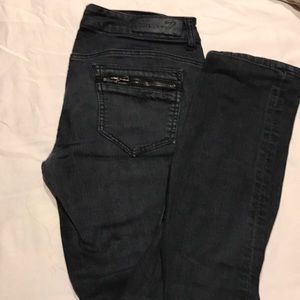 Black skinny moto jeans